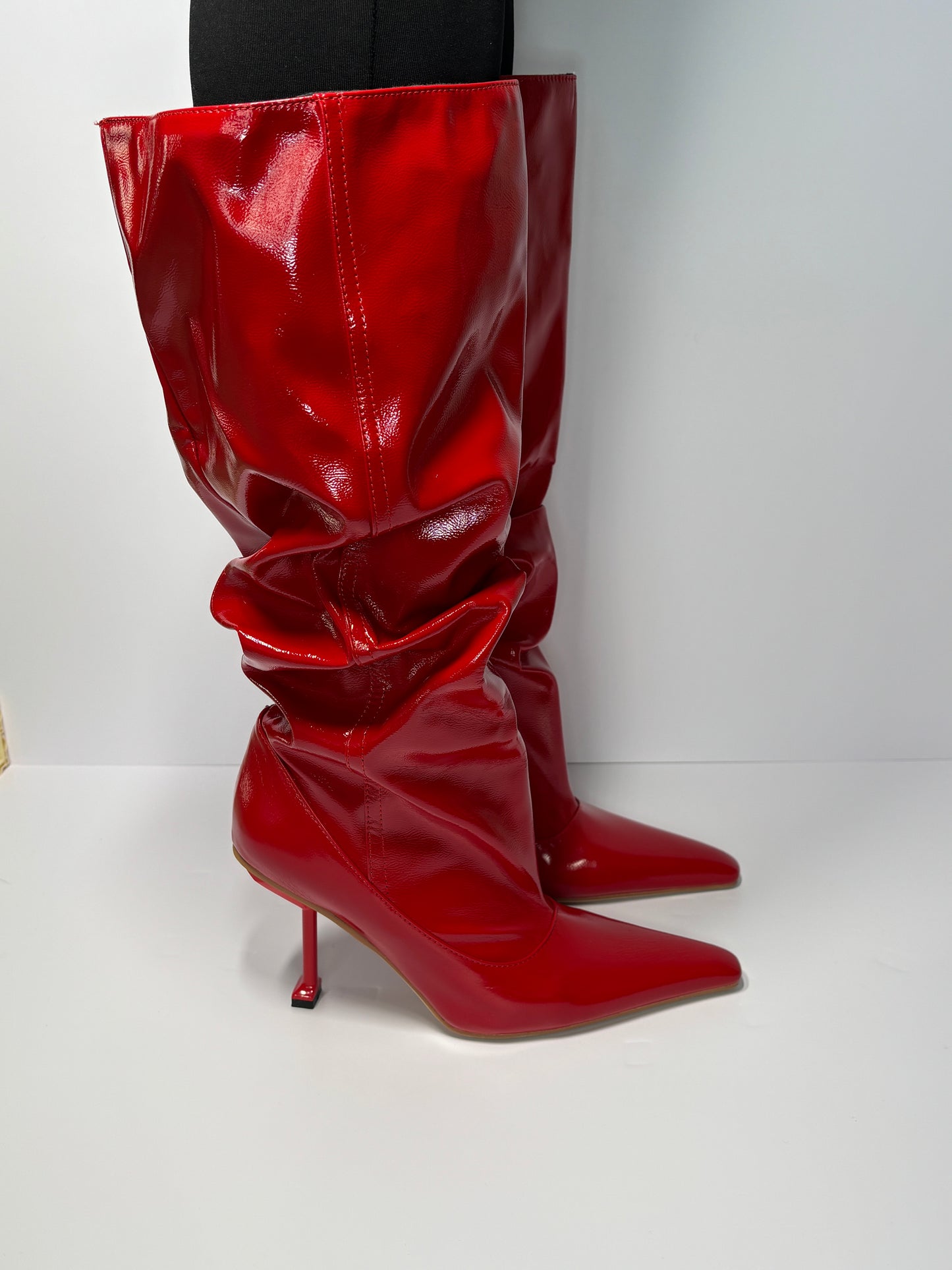 Ruched glossy red boots